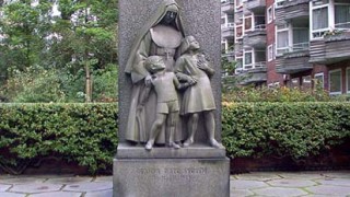 The memorial in front of the Jeanne D'arc School for the killed civilians (photo: Peter Jensen)